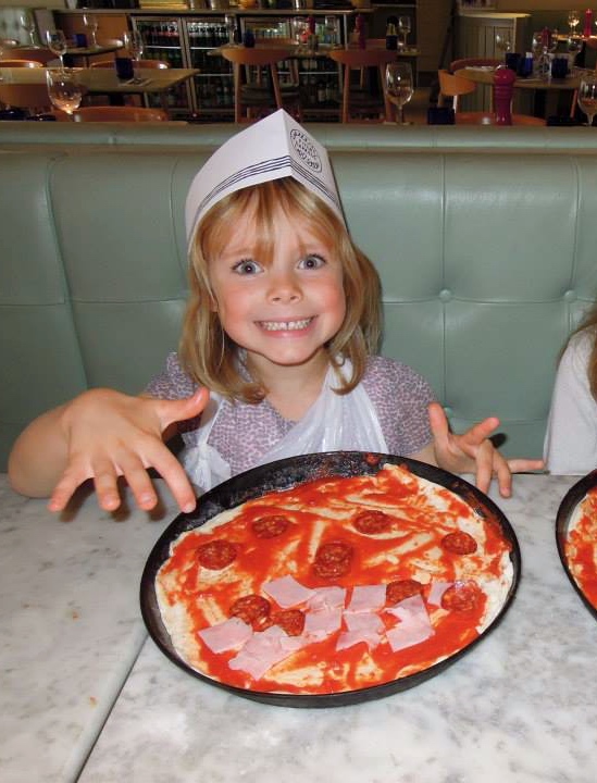 Sofia having lots of fun at a Pizza Express party
